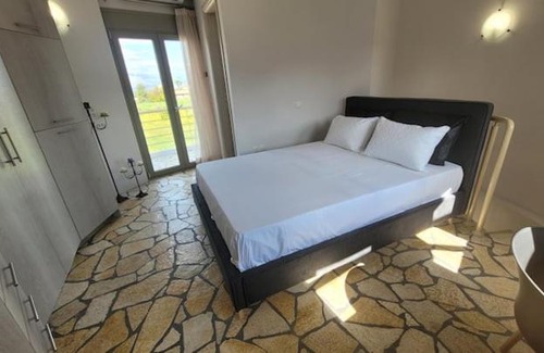 Aigialeia Casa | Temeni windmills