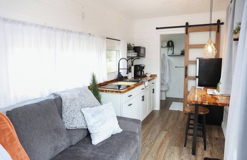 Mingoville Cabina | The Bellefonte Campground presents: The Luxury Hideaway Container Home, hot tub, Rooftop veranda, and more.