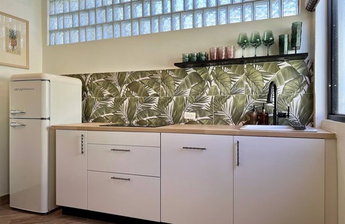 Parque Casa | The Bungalows by HOUS offer a lush tropical paradise perfect for a relaxing getaway.