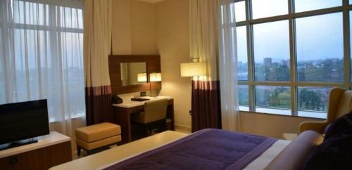 Abuja Cabina | The Envoy Hotel and Suites