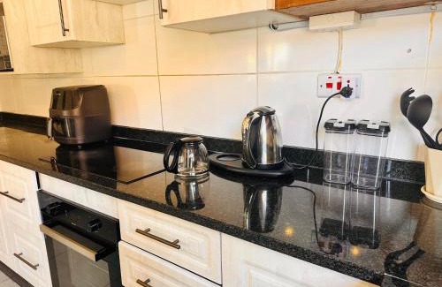 Gaborone Apartamento | The Exec Home Self Catering Villa