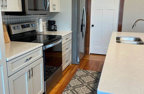 Cascade Casa | The Falls Inn-A renovated 2-story 3 bedroom house next to river in Cascade, IA