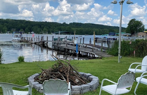 Canadohta Lake Cabaña | The Goldfinch rustic lakefront cottage at The Pier at Canadohta Lake sleeps 2!