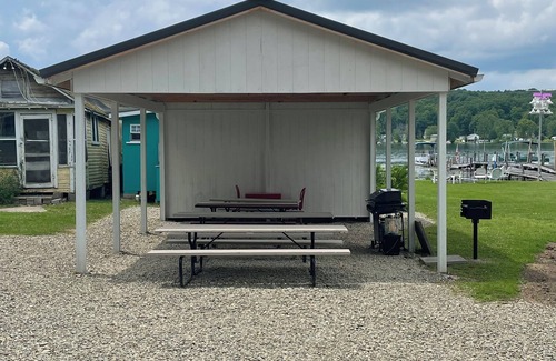 Canadohta Lake Cabaña | The Goldfinch rustic lakefront cottage at The Pier at Canadohta Lake sleeps 2!