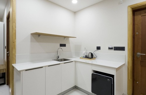 Kuppaayil Hotel | The Habitat Suites