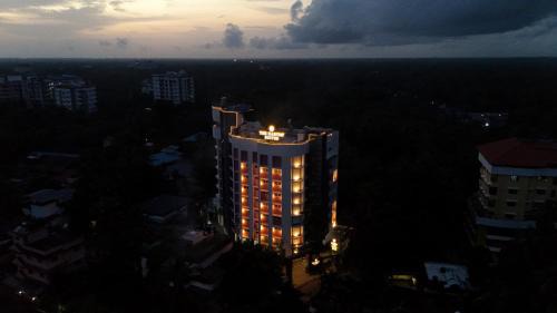 Kuppaayil Hotel | The Habitat Suites-Walkable distance to Guruvayoor temple