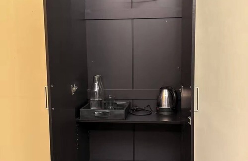 Madurai Apartamento | The Madurai lounge-over looking Meenakshi temple. top floor of hotel Padmam