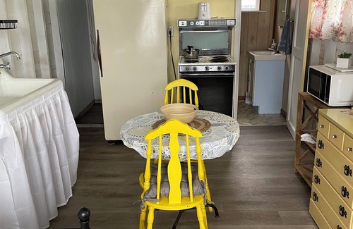 Canadohta Lake Cabaña | The Purple Martin unique rustic lakefront cottage at the Pier at Canadohta Lake!