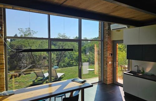 Capriglio Casa | The Window on the Forest View