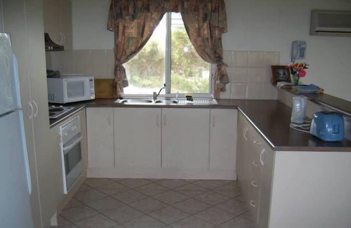 Newland Casa | Esta moderna casa de vacaciones de 4 dormitorios ofrece a las familias y parejas una escapada estupenda.