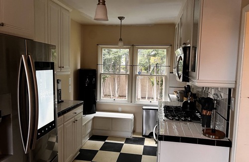 Southwest Anaheim Casa | Timeless Charm: 100-Year Olde Spanish Style Home, in Anaheim.