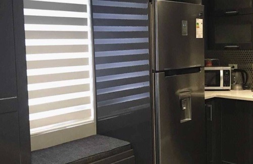 Downtown Apartamento | Tranquility Hotel Suite RF, walking distance to the QPS, Ariapita Ave, & EV Zoo,