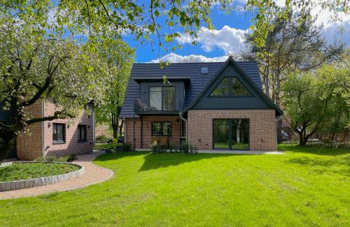 Scheessel Apartamento | Traumhafte Ferienwohnung am Park, großer Balkon, voll ausgestattete Küche, Schreibtisch, WiFi, Smart TV, Carport, Wallbox, Fahrräder