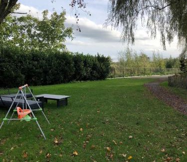 Moerzeke Chalet De Esquí | Trendy chalet aan visvijver