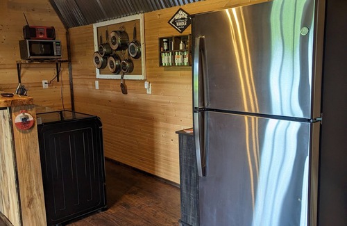 Jasonville Cabina | Unique cozy 14x40 Cabin with a nice deck by the water .