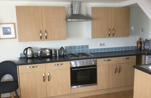 St. Margaret's Hope Cabaña | Casa de playa única en un pueblo pintoresco.