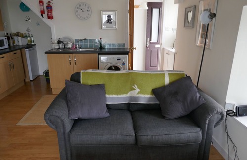 St. Margaret's Hope Cabaña | Casa de playa única en un pueblo pintoresco.