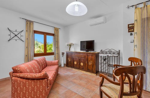 Loiri Casa | Casa de vacaciones "Villetta delle Rose" con jardín, terraza y balcón