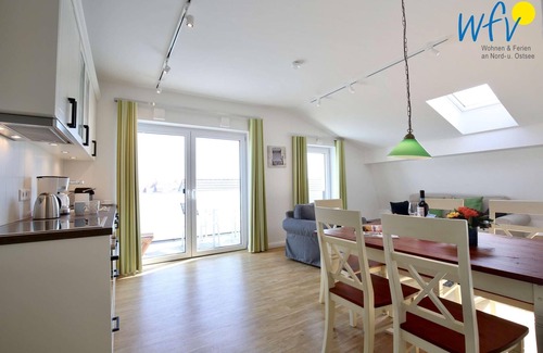 Wangerooge Apartamento | Vacation with a sunny balcony and your own beach chair on the beach
