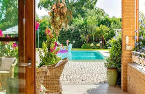 Alghero Villa | VILLA DOLORES , with a spectacular swimming pool with hydromassage and a big garden for the children - IUN S3325