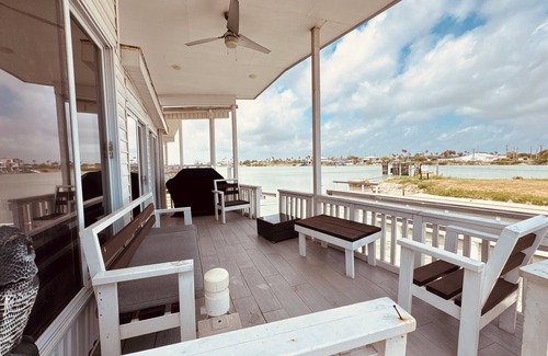 Port Isabel Cabaña | Waterfront 1BR 2 bed in Long Island Village; Watch for Dolphin from the deck!