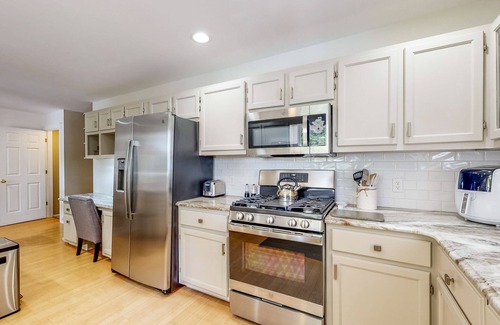 Salisbury Casa | Waterfront allergy-free home with 40-foot fishing dock, canoe, home theater