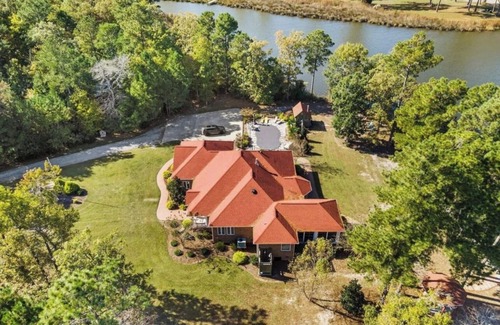 Pinecrest Casa | Waterfront Mansion w/ Saltwater Pool, Dock, Game room, Tiki Bar, Kayaks + More