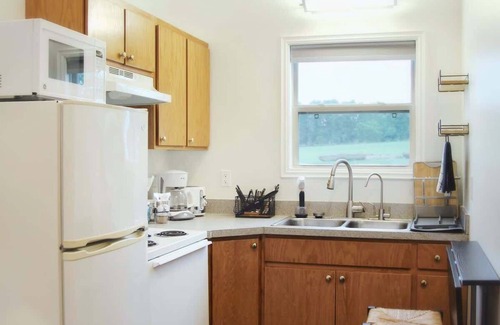 Caplinger Mills Cabaña | Water’s Edge Cabin: King & Queen Beds (Cabin 4)