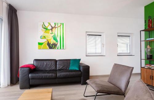 Offingawier Apartamento | Welcome in - Beneden appartement direct aan het Sneekermeer met tuin