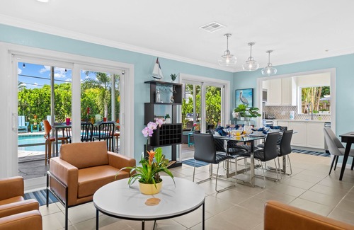 Poinsettia Heights Casa | Welcome to Pelican Landing, A Cozy Tropical Heated Pool Home!