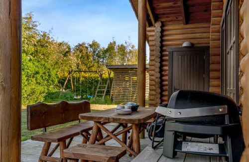 Fjerritslev Casa | Well-Maintained Log House With Hot Tub, Sauna And Covered Terrace In Thy