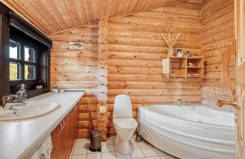 Fjerritslev Casa | Well-Maintained Log House With Hot Tub, Sauna And Covered Terrace In Thy