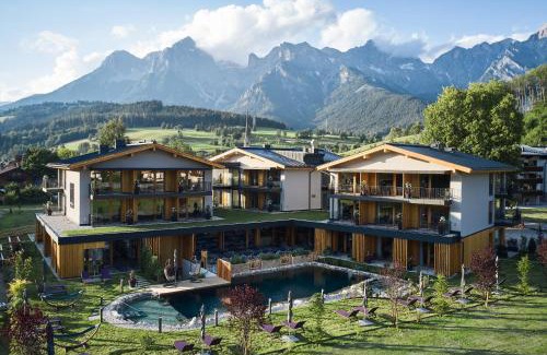 Maria Alm am Steinernen Meer Hotel | Wellness und Brunch Hotel MorgenZeit beheizter Naturpool mit Sandstrand Genuss Frühstück bis 13 Uhr Hochkönig Sommercard