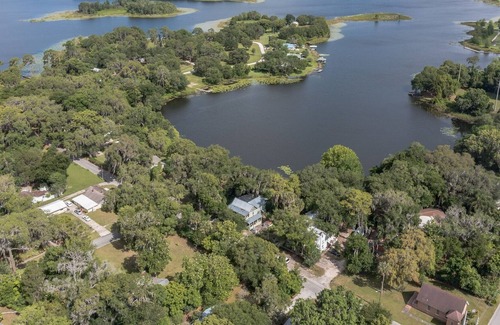 Crescent City Casa | West Stella Lake House with Outdoor Pool Table & Fireplace by RedAwning