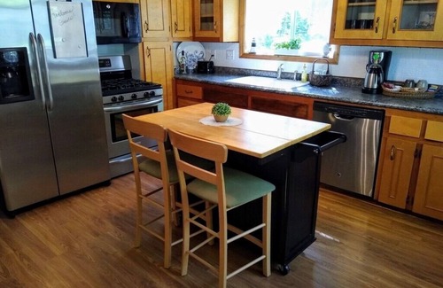 Caseville Cabaña | ‘Whispering Oaks’ Cottage with Private Lake Access, Outdoor Fire Pit and More!
