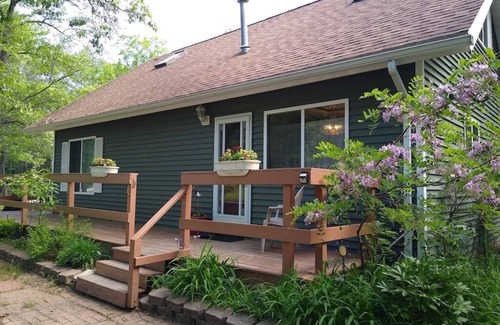 Caseville Cabaña | ‘Whispering Oaks’ Cottage with Private Lake Access, Outdoor Fire Pit and More!