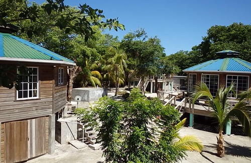 Isla de Utila Cabaña | White Sand Beach-Front Cottages de snorkel, kayak y bucear en frente de playa !!