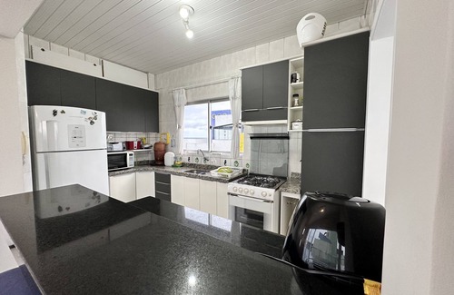 Matinhos Apartamento | Amplia cobertura frente al mar y a la barbacoa