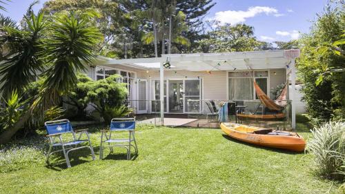 Copacabana Casa | Wisteria Cottage on the Lagoon/Beach