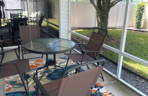 The Villages Villa | WOW CLOSED IN COURTYARD VILLA, GOLF CART, 2 BEDROOMS AND WALK TO 5 LOCAL POOLS.