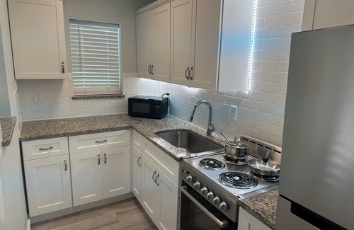 Sunset Beach Casa | Yellow Beach House on Treasure Island with Central AC, One block from Beach