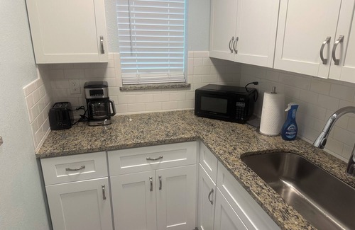 Sunset Beach Casa | Yellow Beach House on Treasure Island with Central AC, One block from Beach