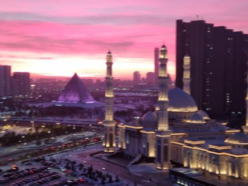 Уютная квартира на Кошкарбаева 26, Астана
