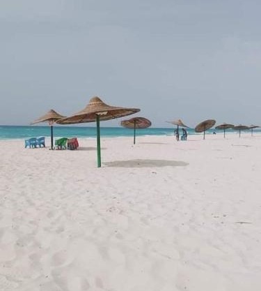 قرية الكروان شالية بجنينة خاصة 2 غرفة نوم