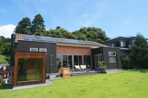 爽やかな風吹き抜けるデザイナーズ邸,螺旋階段,BBQ,サウナCasa SoleLuna