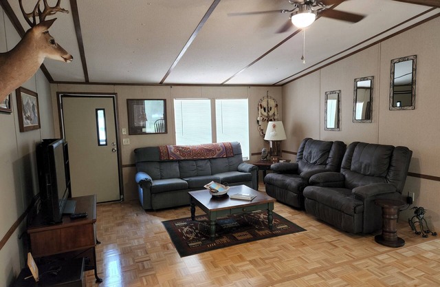 1-1/2 acre Park like wooded setting. Clean 3/2 with plenty of parking.