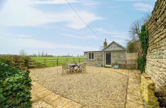 Surrounded by fields, The Tin Cottage is a peaceful retreat close to The Cotswolds.