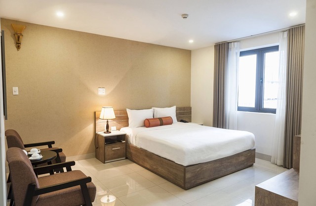 HABITACIÓN DOBLE CAMA, JARDÍN BONITO, ÁREA DE PLAYA, CON DESAYUNO
