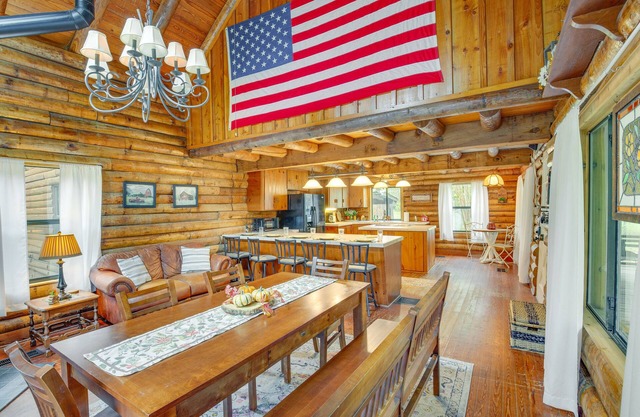 1 Mi to Lake: Log Cabin Retreat w/ Fire Pit