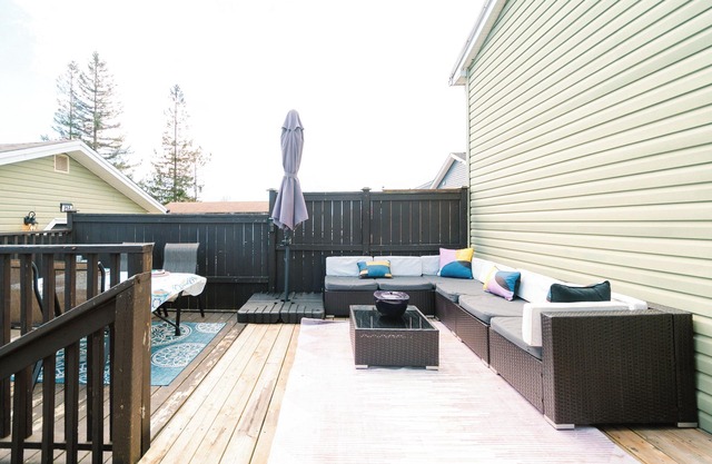 10 minutes to downtown or the beach! Stylish home with large backyard and deck.